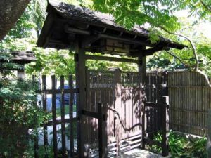 Japanese garden curved roof entry gate