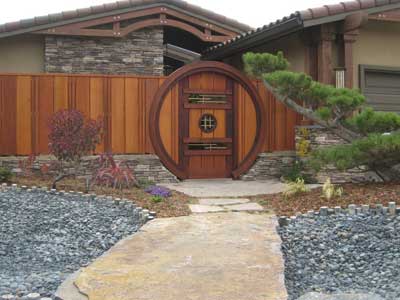 Stunning moon gate entry with Japanese style wide board fence